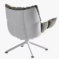 Gray Leisure Chair With Plush Cushions And White Star Shaped Metal Base