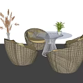 Round Wicker Outdoor Sofa With White Cushions Table And Plants For Patio