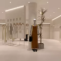 Modern Clothing Store Interior With Mannequins Clothing Displays Decorative Plants And Minimalist Design