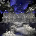 Banquet Hall with White Floral and Hanging Bubble Decorations White Drapery Backdrop and Lighting