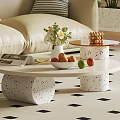 Modern Coffee Table With Speckled Base Fruits Vase And Magazines In Living Room