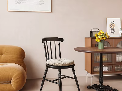Comfortable Black Accent Chair With Beige Padded Seat Next To Brown Sofa And Wall Art 3d model