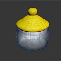 Decorative Glass Storage Jar With Yellow Lid And Colorful Flower Patterns