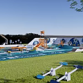 Outdoor Children's Play Area With Colorful Structures Green Lawn And Trees