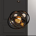 Celestial Chandelier with Golden Circular Rings and Planet Decorations in Modern Interior Design