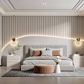 Modern Bedroom Interior With Striped Wall Arched Lighting Bedside Lamps Pillows Round Ottoman And Rug
