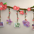 Photo Wall With Cherry Blossom Branches Star Heart Shaped Ornaments Hanging Photos And String Lights