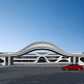 Modern Entrance Gate With Curved Arch Structure And Red Car Under Blue Sky