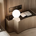 Modern Wooden Nightstand In Bedroom Interior With Open Book And White Round Lamp