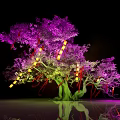 Purple Tree Landscape Sculpture Featuring Green Trunk Yellow Lanterns Red Ribbons Black Background And Reflection