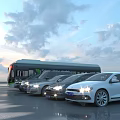Row of Parked Cars Including Bus and Sedans in Open Area With Cloudy Sky