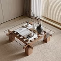 Coffee Table With Glass Top And Wooden Base Displaying Open Book Coffee Mug And Vase