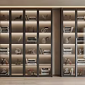 Modern Glass Door Storage Cabinets With Interior Lighting And Decor Items In Living Room