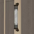 Contemporary Cylindrical Wall Light With Metal Frame And Warm Yellow Glow On Wooden Wall