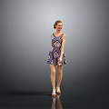 Fashionable Woman In Patterned Dress Standing Gracefully With Heels Against Grey Background