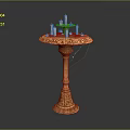 Elegant Golden Pedestal Table With Decorative Candles On Top And Intricate Carved Decorations