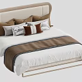 Modern Double Bed with Beige Headboard Multiple Pillows and Brown White Striped Blanket