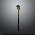 Ancient Decorative Weapon with Golden Dragon Head Handle and Wooden Shaft in Traditional Ornate Design