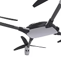 Smart Drone with Four Propellers Black Body Gray Landing Gear and Gold Accents