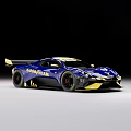 Blue And Yellow Monster Race Car With Aerodynamic Design And Rear Wing