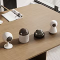 Small Daily Use Electrical Appliances with Various Designs on Wooden Table