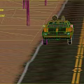 Orange Sports Car Driving On Road With Yellow Double Solid Lines And Sandy Ground Poles