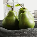 Three Fresh Green Pears Arranged In Black Bowl With Transparent Glass In Kitchen Setting