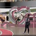 Large Pink Rabbit Decoration Display In Shopping Mall Interior With Heart Elements 3d model