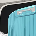 Blue Striped Travel Suitcase With Modern Design Wheels And Snowy Landscape