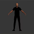 Man Standing In Gray Background Wearing Black Short Sleeved Shirt And Pants With Arms Outstretched