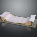 Natural Outdoor Scene With Small Curved Skate Ramp And Green Grass On Ground