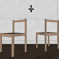 Two Minimalist Wooden Leisure Chairs In Bright Room With White Wall And Smooth Wooden Floor