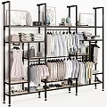 Neatly Organized Closet With Hanging Folded Clothes Bags Shoes And Decorative Items