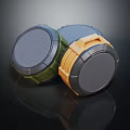 Modern Round Portable Speakers In Green And Orange With Durable Casing Design
