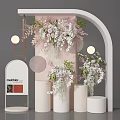 Elegant Floral Installation with Pink White Flowers Hanging Arch Cylindrical Pedestals and Lights