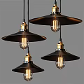 Four Stylish Pendant Lights Featuring Black Long Rods Black Shades Gold Accents And Clear Bulbs