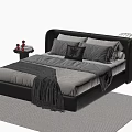 Modern Double Bed With Curved Leather Headboard Multiple Pillows And Round Nightstands