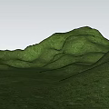 Scenic Park Landscape With Green Rolling Hills And Lush Grass Cover