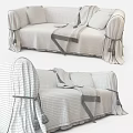 Cozy Two Seater Sofa With Soft Cushions Plaid Blanket And Textured Fabric Skirt