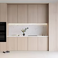 Modern Kitchen With Light Wood Cabinets Marble Backsplash Black Oven And Under Cabinet Lighting