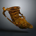 Decorative Household Vessel With Intricate Golden Structure And Artistic Design