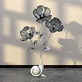 Floral Display Featuring Yellow Flowers in Green Snail Shaped Vase with Light Wall Shadow