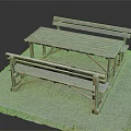 Wooden Outdoor Table With Attached Benches In Gravel Surface And Grass Edge Setting