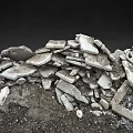 Pile Of Ancient Stone Fragments And Broken Artifacts From Archaeological Site
