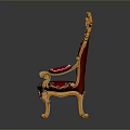 Ornate Royal Chair With Golden Carved Frame And Red Velvet Upholstery