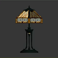 Stained Glass Table Lamp With Geometric Pattern And Metal Base Design