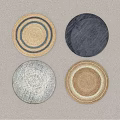 Four Stylish Round Rugs With Different Woven Patterns And Neutral Blue Tones