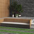 Outdoor Sofa With Wooden Frame By Stone Wall And Green Plants On Lawn Steps