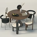 Modern Round Wooden Dining Table Set With Black Armrest Chairs White Cushions Fruit Vase