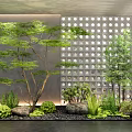 Serene Modern Indoor Landscape With Green Plants Trees Stones And Circular Perforated Partition Wall